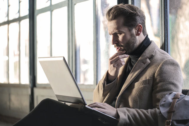 concerned businessman preparing for workplace drug testing