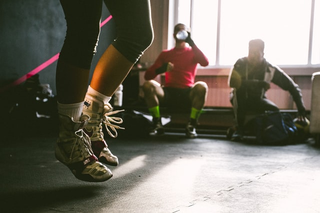 Person in a gym jumping rope