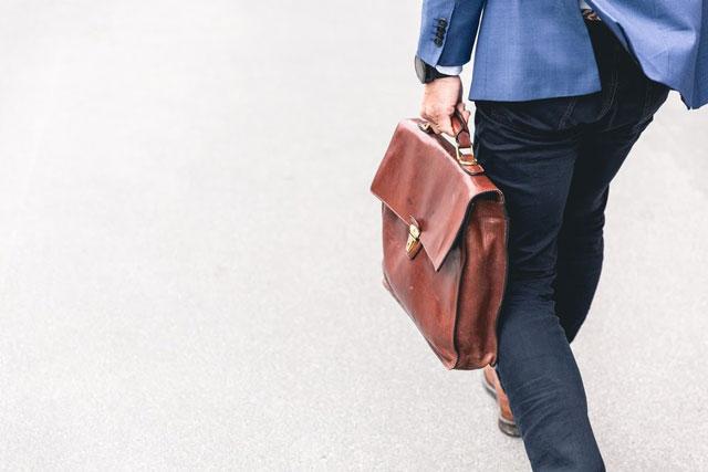 person carrying work bag